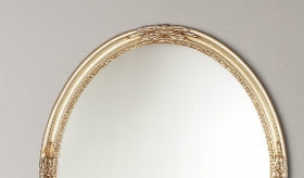 Espejo de pared con marco ovalado