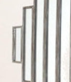 Escultura de pared con espejo geométrico de madera plateada