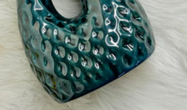 Jarrón de cerámica verde de dos bocas