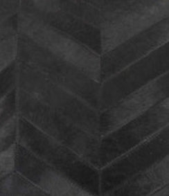 Cojín de piel de vaca negra 