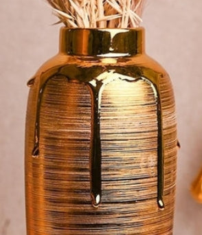 Jarrón de cerámica de lujo dorado