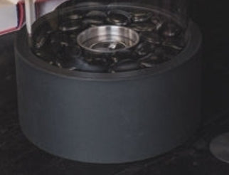 Chimenea de bioetanol redonda de metal negro y vidrio 