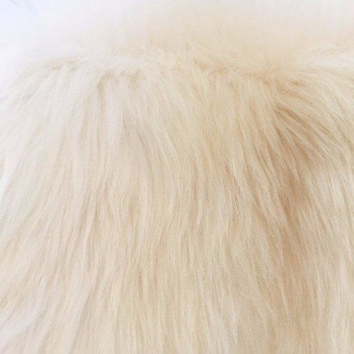 Alfombra de piel de cordero color marfil 